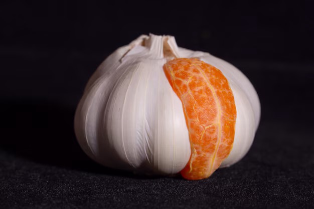 Orange slice in garlic bulb